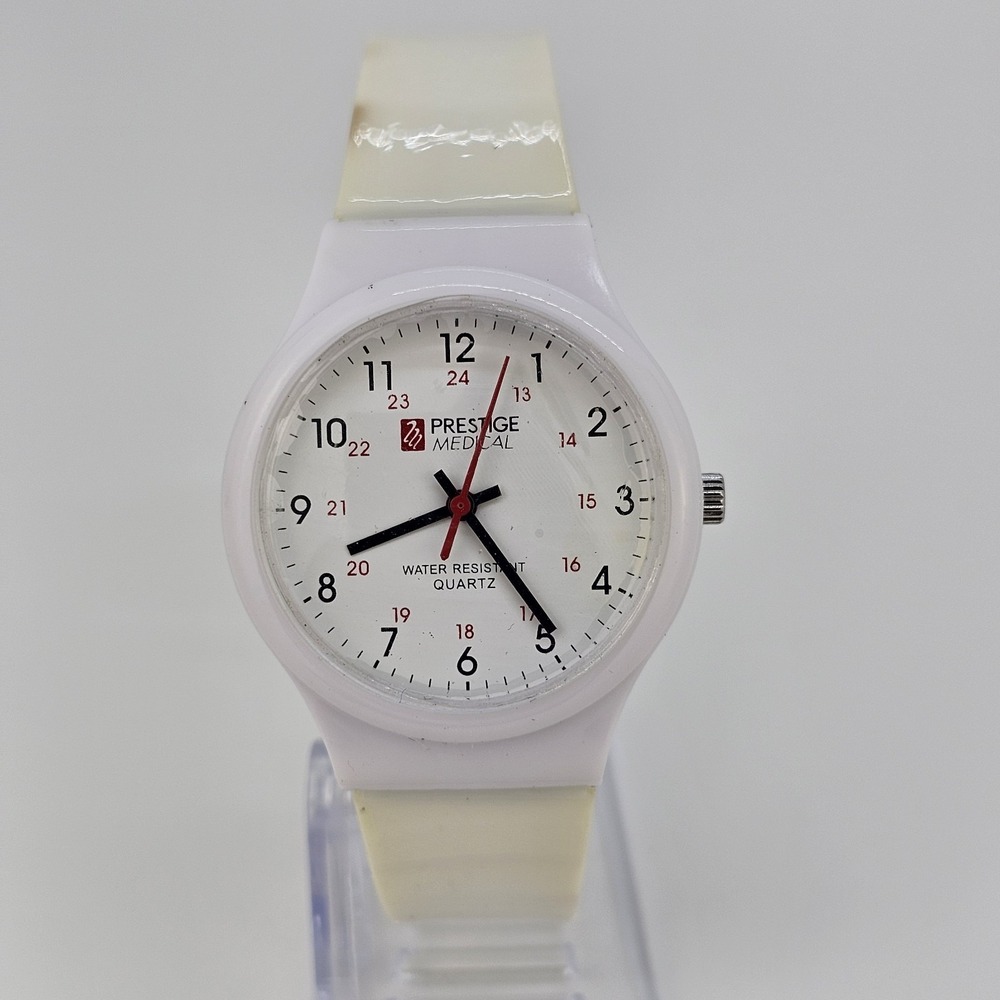 Prestige Medical Unisex Watch 38MM White‎ Dial Cream Plastic Bands New Battery
